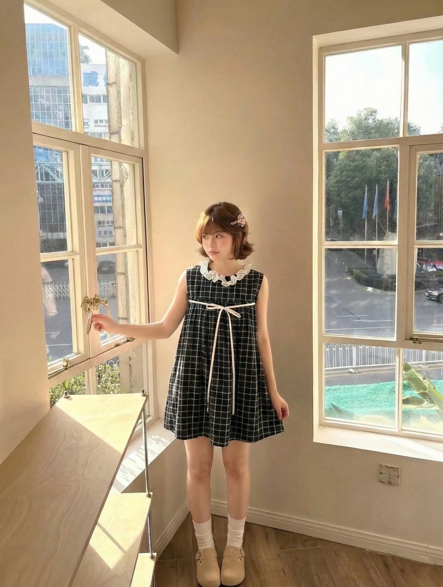 Đầm babydoll sát nách caro đen