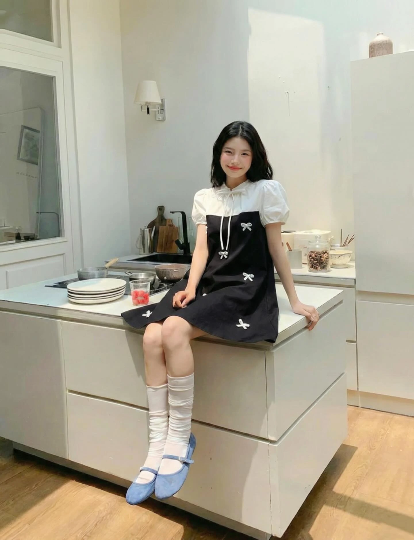 Đầm babydoll đen phối kem nhiều nơ 