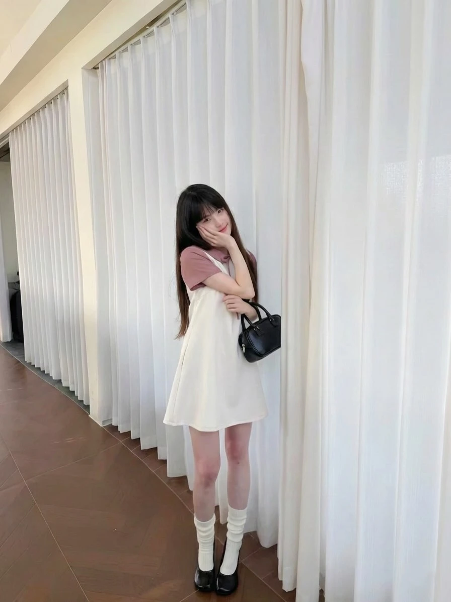 Đầm babydoll kem phối hồng nơ