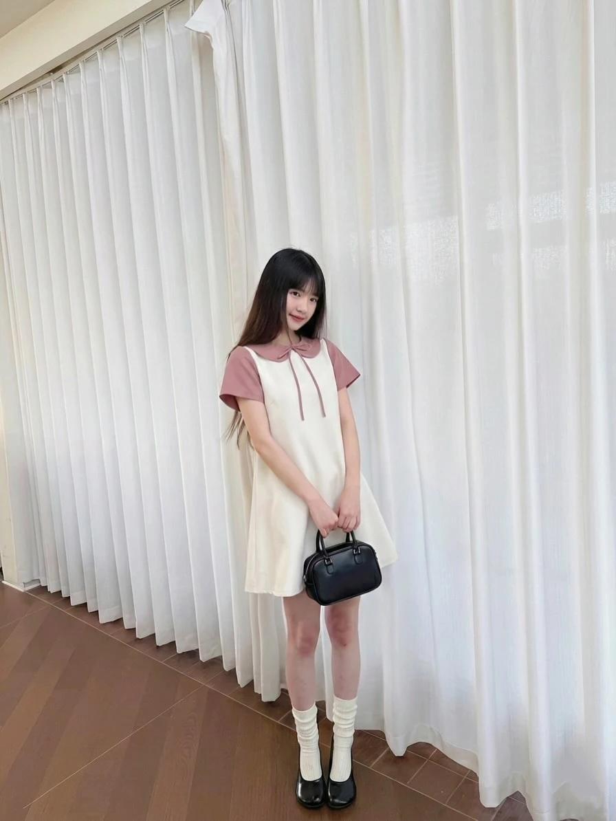 Đầm babydoll kem phối hồng nơ