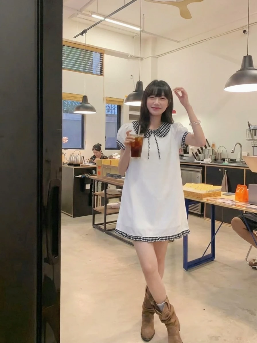 Đầm babydoll trắng phối caro đen tay bèo nơ