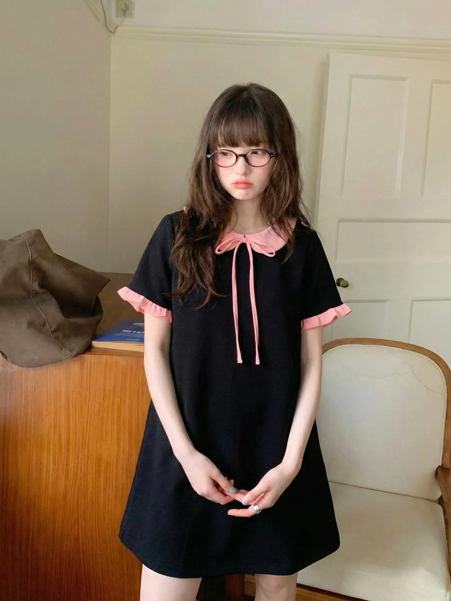 Đầm babydoll đen phối hồng bèo