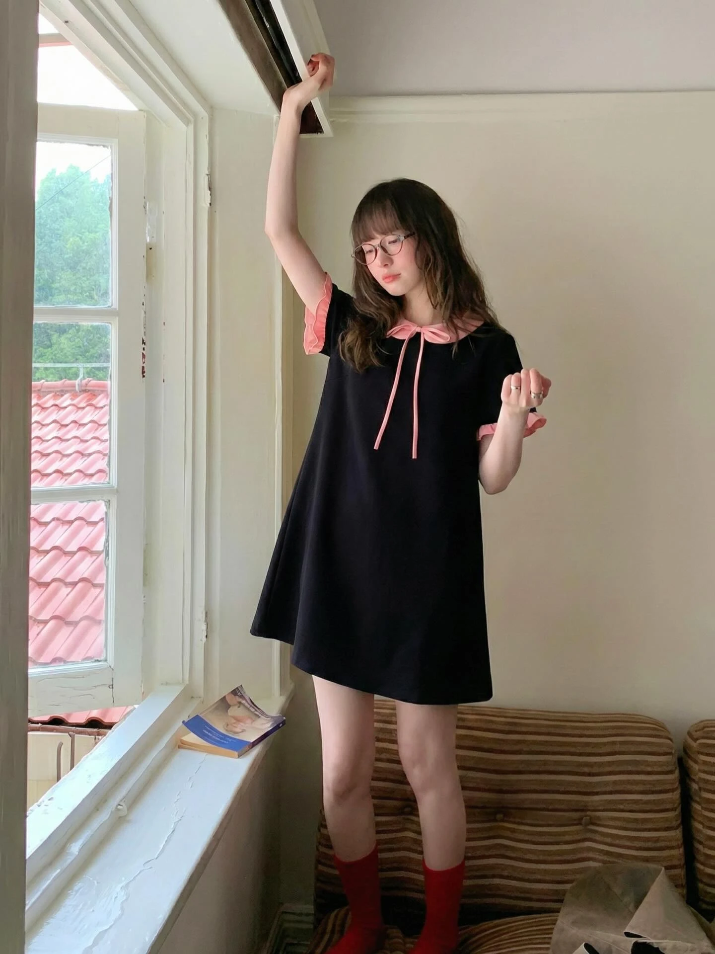 Đầm babydoll đen phối hồng bèo