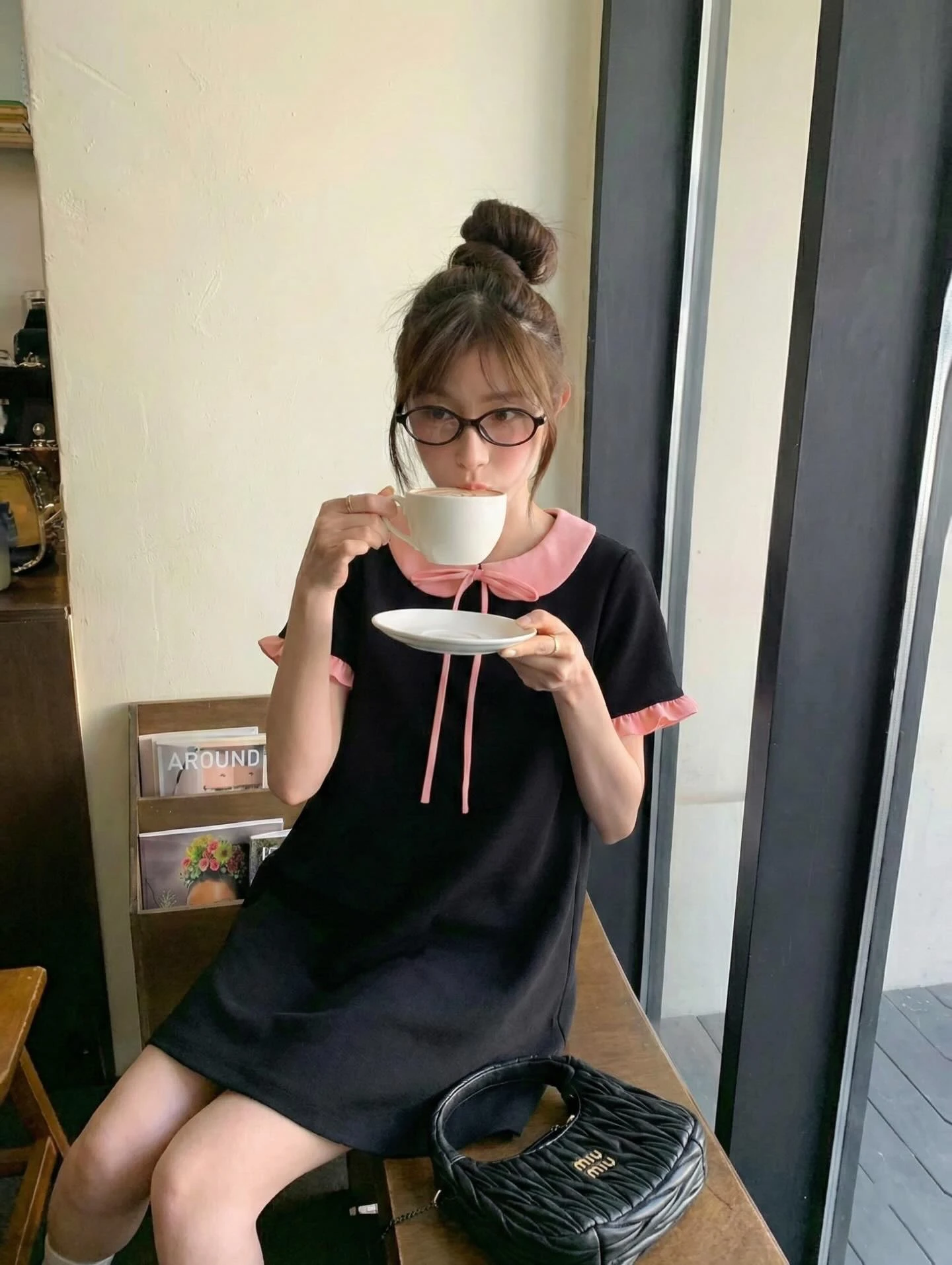 Đầm babydoll đen phối hồng bèo