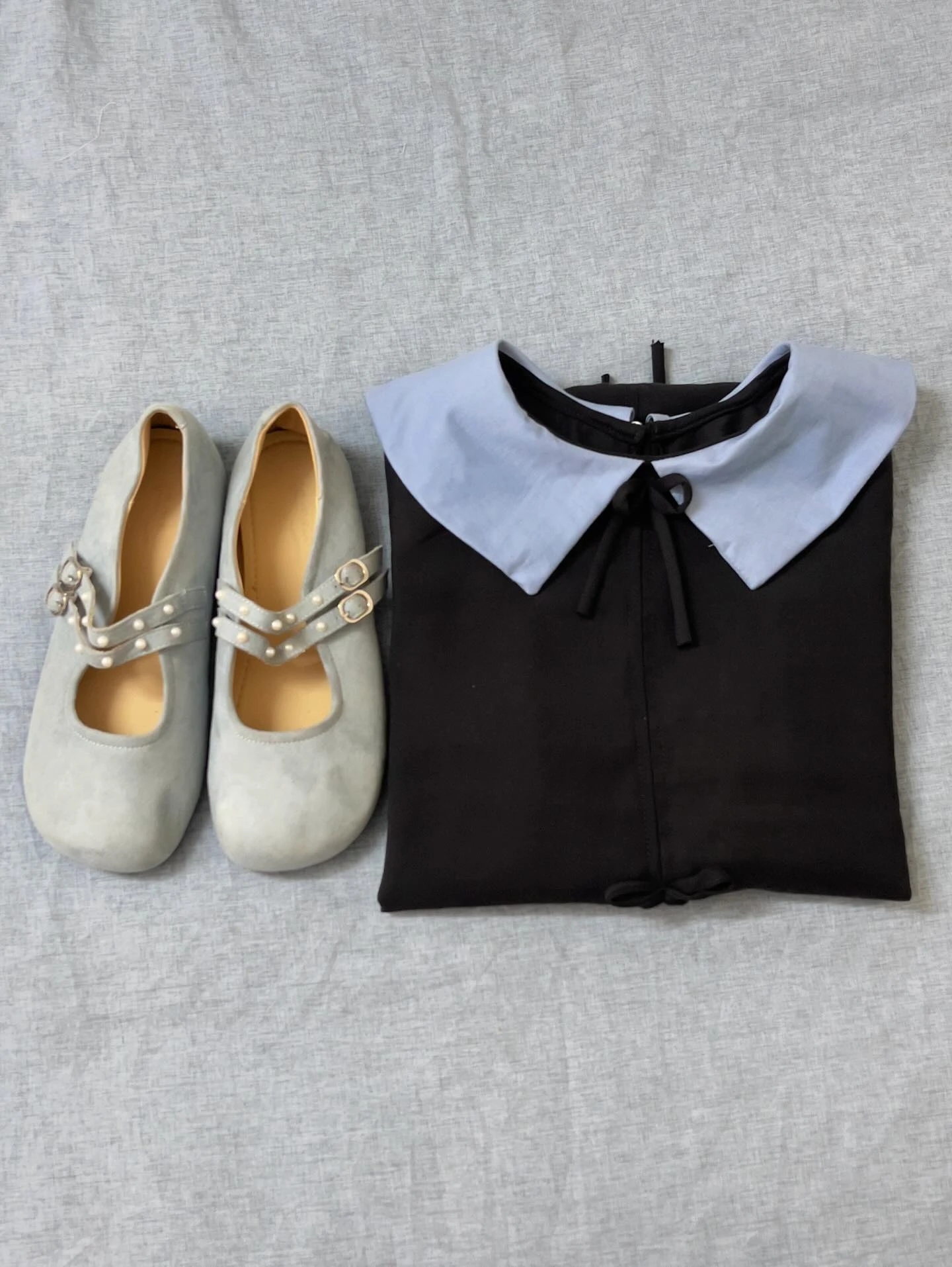 Đầm babydoll đen nơ phối cỗ + tay xanh dương