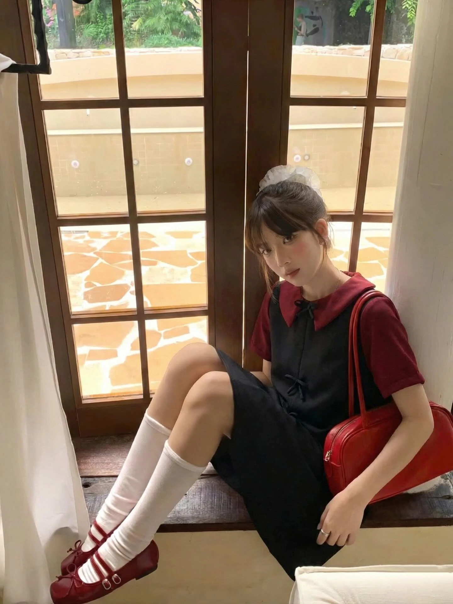 Đầm babydoll đen nơ phối đỏ đô