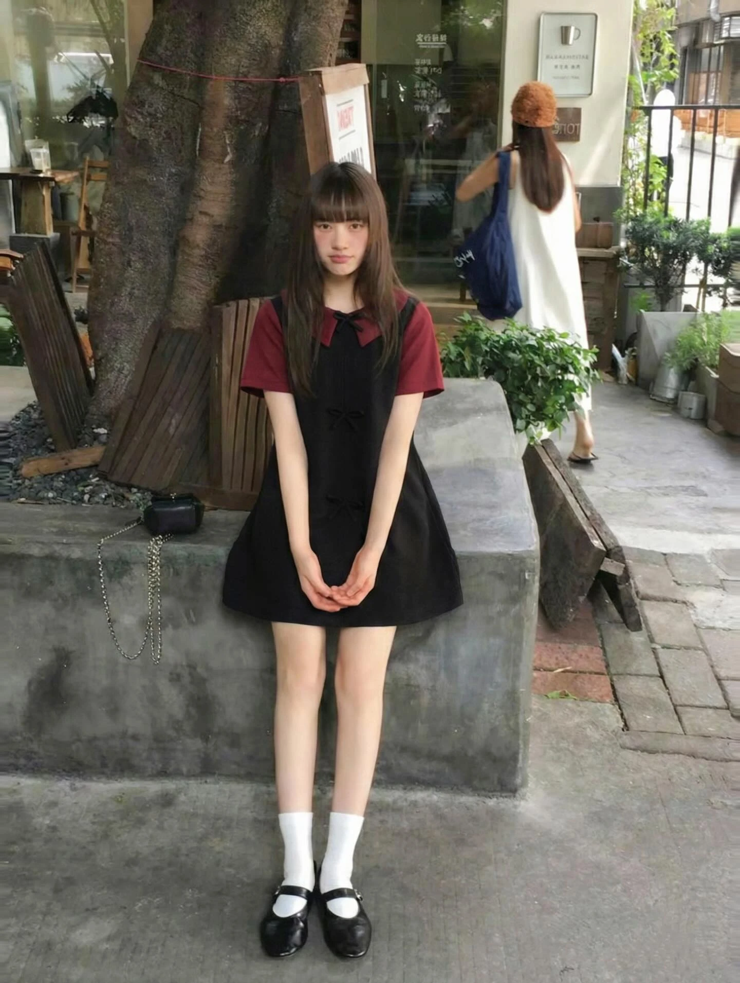 Đầm babydoll đen nơ phối đỏ đô