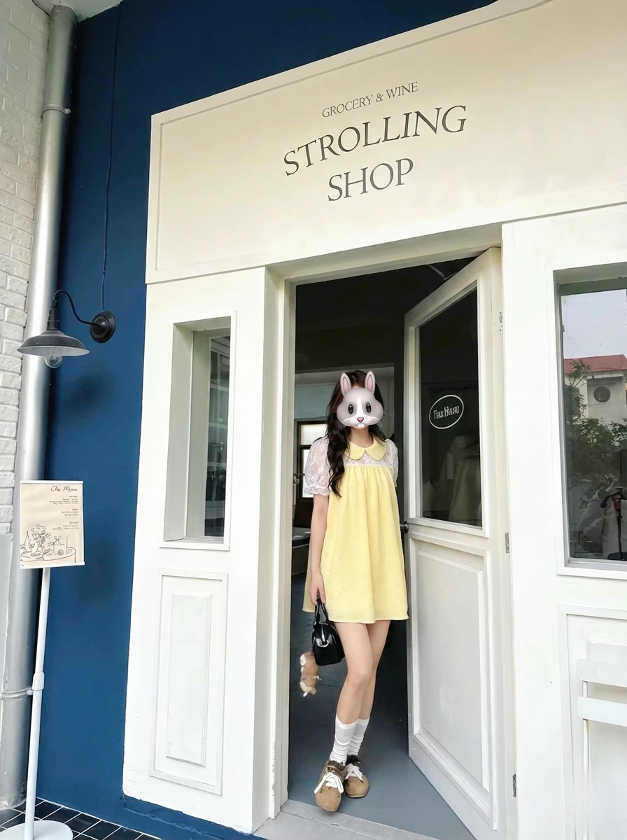 Đầm babydoll vàng phối ren 