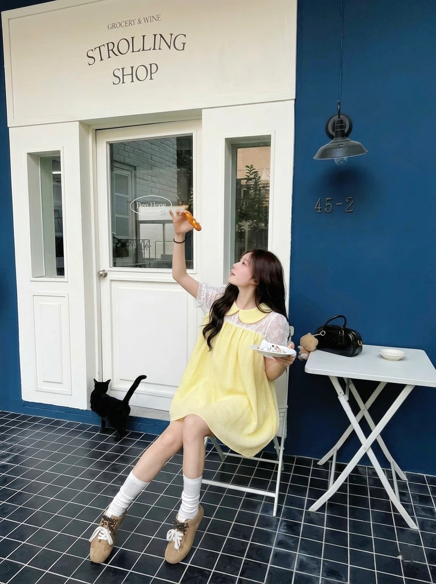 Đầm babydoll vàng phối ren 