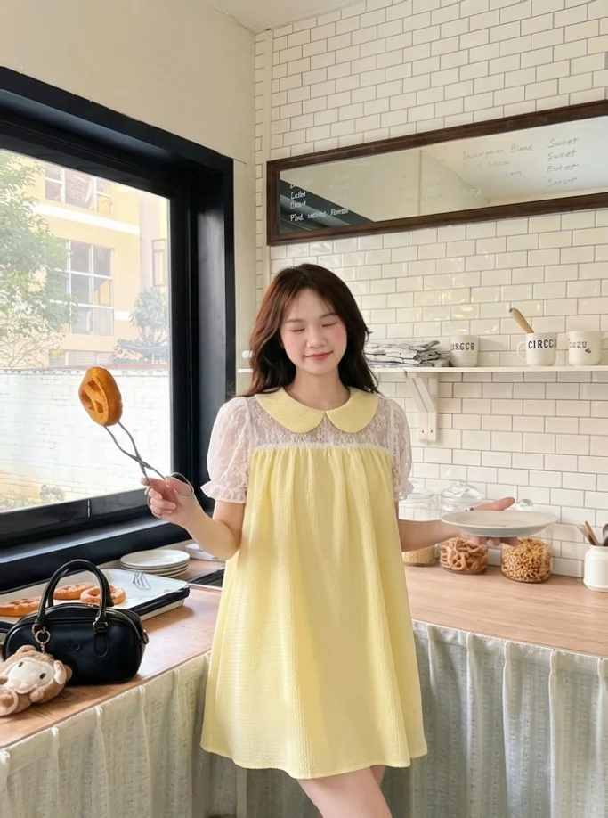 Đầm babydoll vàng phối ren 