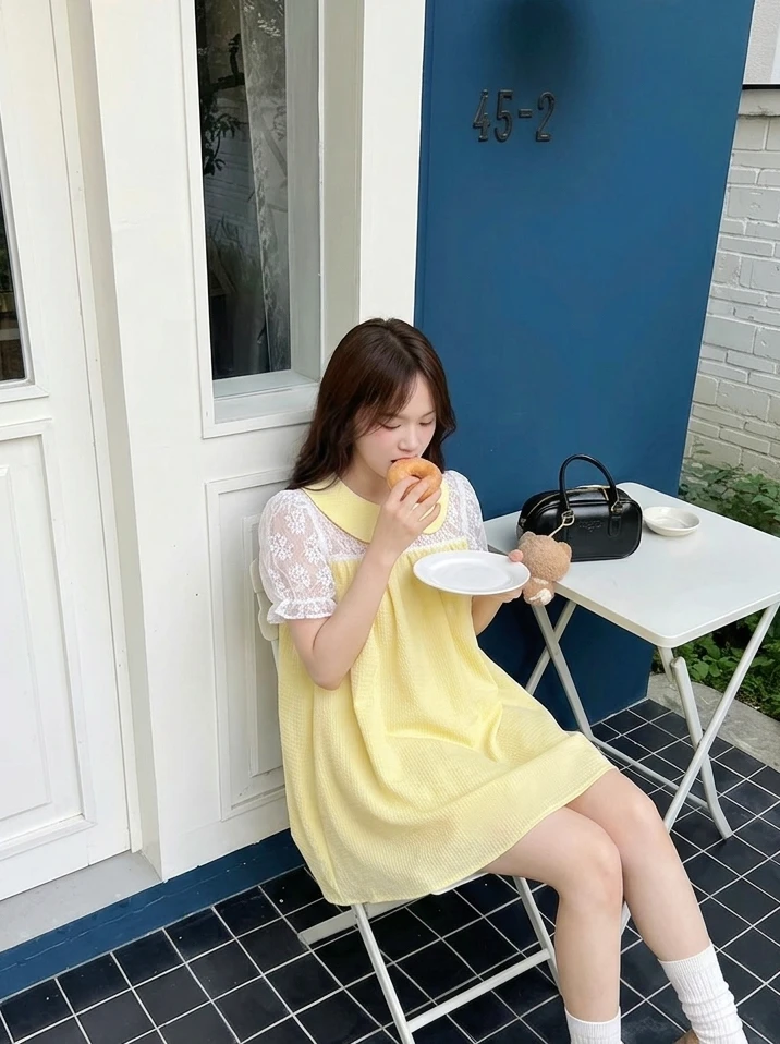 Đầm babydoll vàng phối ren 