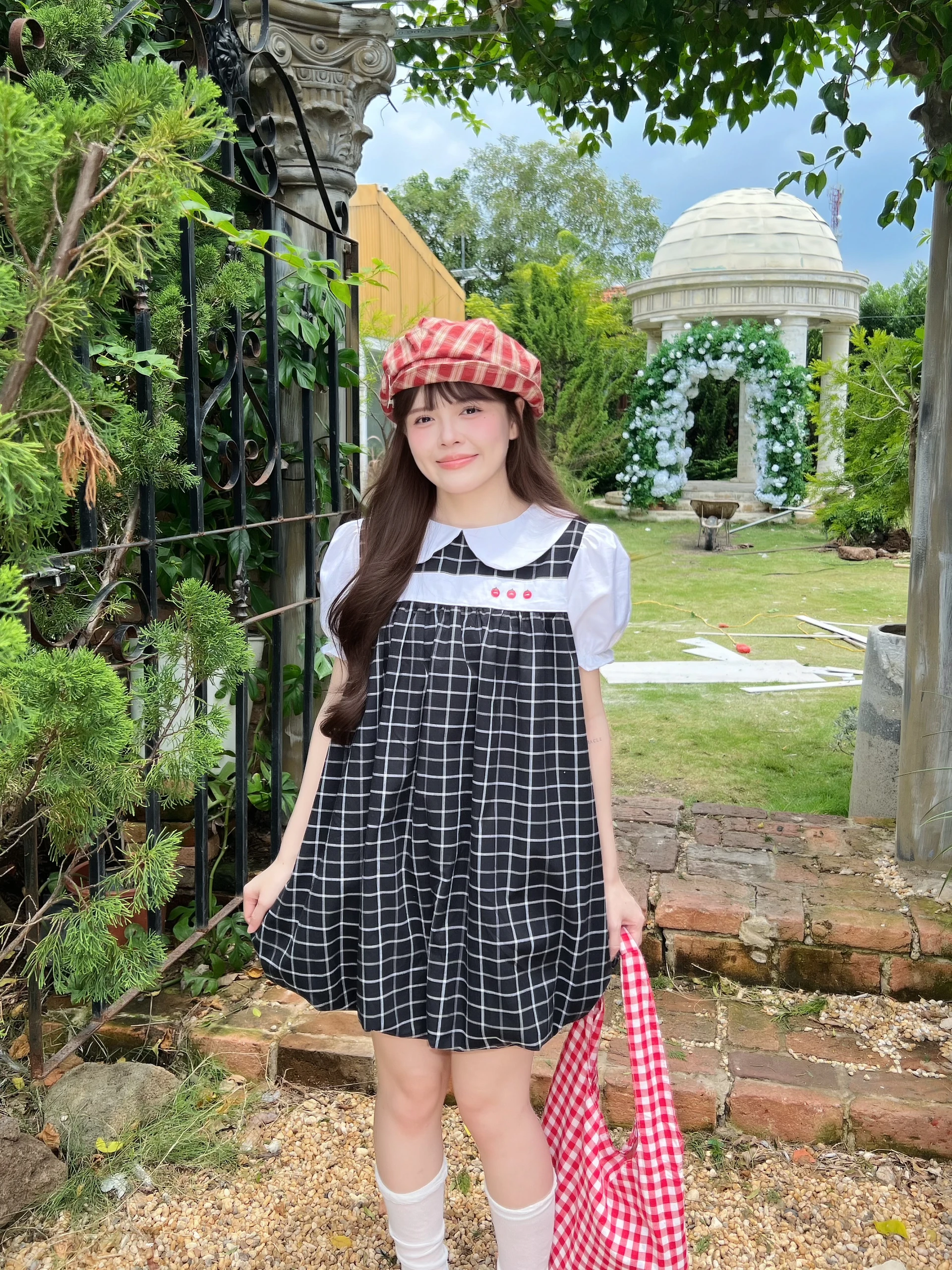 Đầm babydoll caro đen 3nút cà chua