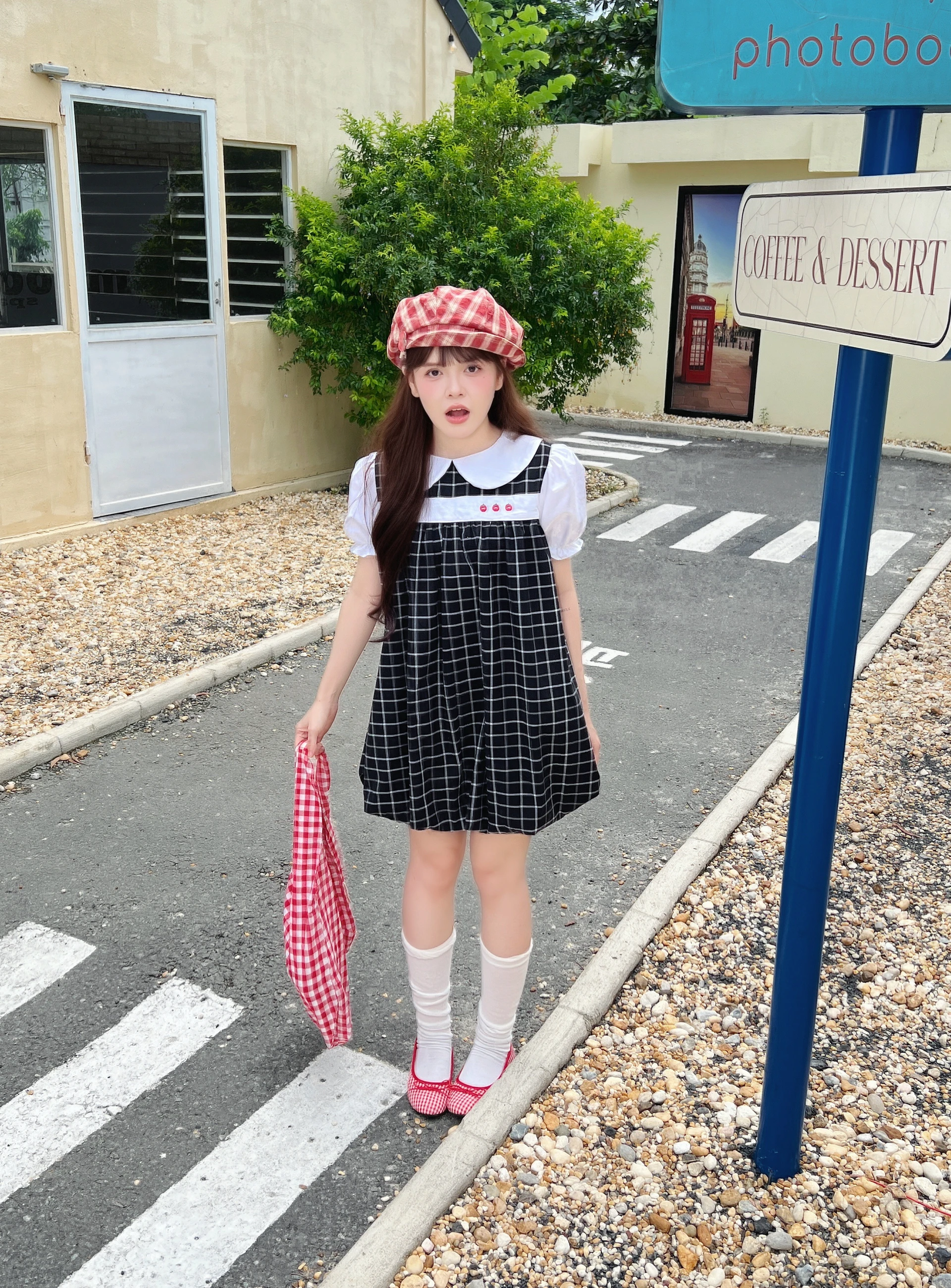 Đầm babydoll caro đen 3nút cà chua